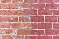 Fragment of the restoration of the old red brick wall Royalty Free Stock Photo
