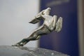 Fragment of retro old car Volga GAZ - 21 taxi cab / USSR 1960. the symbol of the automobile - the handsome deer.