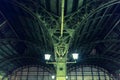 Fragment of roof construction the city railway station Vitebsky. Vaulted structure of steel roof frame truss windows