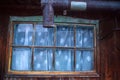 Fragment of the roof of a village house with drainpipe Royalty Free Stock Photo