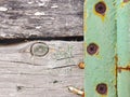 Fragment of a rustic gate in a fence close-up. Old gray weathered wooden beams and door hinge. Vintage illustration or background Royalty Free Stock Photo