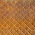 Fragment of rusty wall, diagonal pattern, grunge background Royalty Free Stock Photo