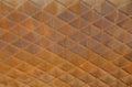 Fragment of rusty wall, diagonal pattern, grunge background Royalty Free Stock Photo