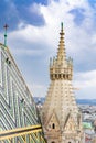 Fragment of Saint Stephen`s Cathedral Stephansdom. Colorful roof and tower. Wien. Vienna. Austria. Royalty Free Stock Photo
