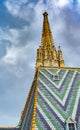 Fragment of Saint Stephen`s Cathedral Stephansdom. Colorful roof. Wien. Vienna. Austria. Royalty Free Stock Photo
