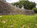 Fragment of Seoul City Wall in the Namsan Park in Seoul, ancient historical stone wall, South Korea Royalty Free Stock Photo