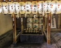 Fragment of a shinto shrine with purification ladles, sake offer Royalty Free Stock Photo