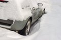 Fragment of the side part of the snowbound car Royalty Free Stock Photo