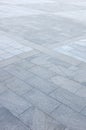 Fragment of the square paved of a large granite tiles Royalty Free Stock Photo