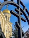 A fragment of St. Nicholas Cathedral in the city of Kislovodsk on the background of a cast-iron fence. Royalty Free Stock Photo