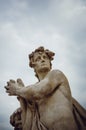 Fragment of the statue in Peterhof in St. Petersburg. Sights of Russian culture.