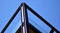 A fragment of the steel and glass metal facade of building. Royalty Free Stock Photo