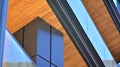 A fragment of the steel and glass metal facade of building. Royalty Free Stock Photo