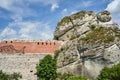 Fragment of a stone defensive wall of a medieval castle in Olsztyn Royalty Free Stock Photo