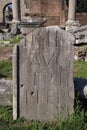 Fragment of a stone with latin script