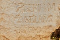 Fragment of a stone monument with the mention of Pontius Pilate near Herod's palace in the Caesarea Primorskaya National Park Royalty Free Stock Photo