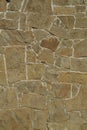 Fragment of the stone wall with a flat pattern Royalty Free Stock Photo