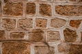 fragment of stone wall with shell rock masonry. Natural stone texture background. Royalty Free Stock Photo