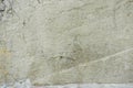 Fragment of texture of concrete wall of building with old cracked plaster with damp moldy cracks. Abstract background. Empty space Royalty Free Stock Photo