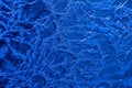 Fragment of the texture frost patterns on the window glass , blue color tone. Royalty Free Stock Photo