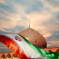 Fragment of traditional Iranian architecture and Iran`s national flag at sunset.