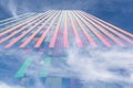 Fragment of an unfinished multi-story residential building or commercial property in the clouds. Background of concrete Royalty Free Stock Photo