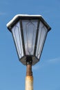 Fragment of the upper part of the street lamp