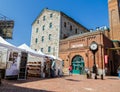 Fragment of view of Toronto distillery historic district square on art fest sunny day Royalty Free Stock Photo