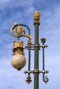 Ornate lamppost with fleur-de-lis decoration Royalty Free Stock Photo