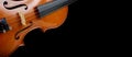 Fragment of a violin on a black background. Concert poster for classical music. Music concept. copy spaces Royalty Free Stock Photo