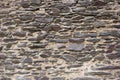 Fragment of the wall from brown flat natural stone Royalty Free Stock Photo