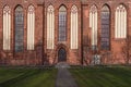 Fragment of a wall of a catholic temple in the rays of sunlight