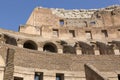 Fragment of the wall of the Colosseum - amphitheater, architectural monument of Ancient Rome