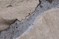 A fragment of a wall of concrete blocks, along which cracks went Royalty Free Stock Photo