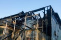 Fragment of the wall of house after a fire