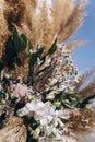 Fragment of a wedding arch for an exit ceremony decorated style of boho.