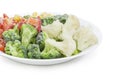 Various frozen vegetables on the white dish closeup Royalty Free Stock Photo