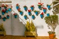 Fragment of white wall and blue flower pots Royalty Free Stock Photo