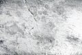 Fragment of a whitewashed wall with damages, textured background Royalty Free Stock Photo