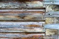 Fragment of a wooden log wall of an old Russian church as the basis of the background.