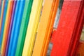 Fragment of a wooden rainbow fence Royalty Free Stock Photo