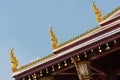 Fragment of the wooden roof with patterns of Grand Palace, Bangkok, Thailand.