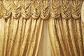 Fragment of a yellow portiere Royalty Free Stock Photo