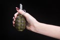 fragmentation grenade in girl hand Royalty Free Stock Photo