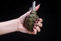 fragmentation grenade in girl hand