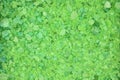 The fragmentation of the salt crystals green background Royalty Free Stock Photo