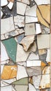Fragmented Mosaic Tile Design Featuring White Green and Beige Stone Material on Cement Wall Royalty Free Stock Photo