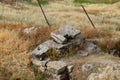 Fragments of ancient buildings, ruins of the ancient city of Hierapolis. Stone blocks with traces of stone machining