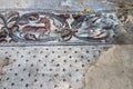 Fragments of ancient religious mosaics on the ruins of a church in the middle of the 6th century AD in northern Israel