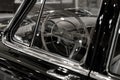 fragments of the body and interior of a retro car in black Royalty Free Stock Photo